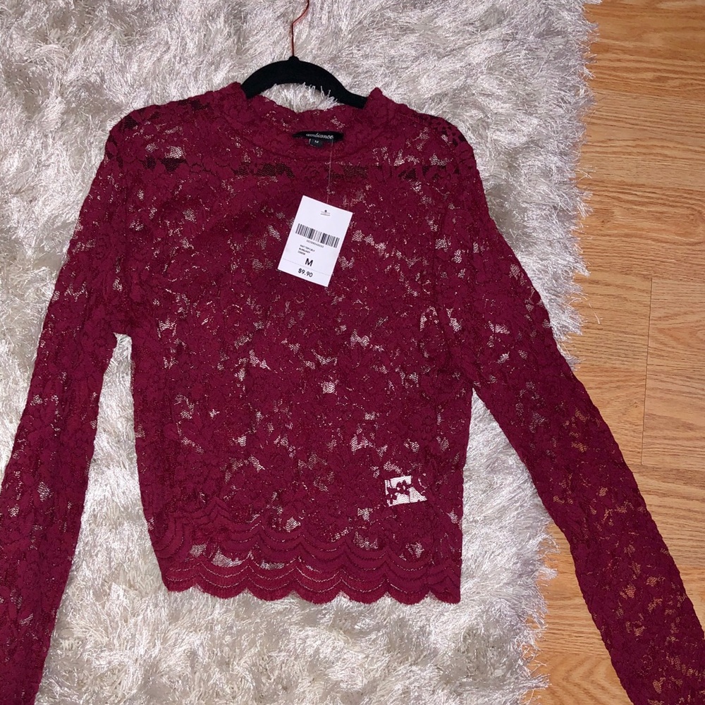 Burgundy blouse/top. Cute and see-through!
